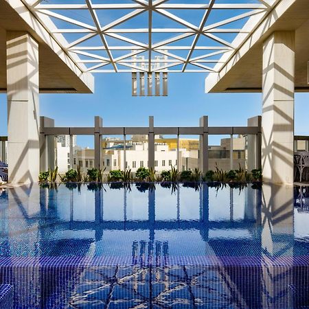 Millennium Place Doha Exterior foto The rooftop pool at the Four Seasons Hotel, Cairo