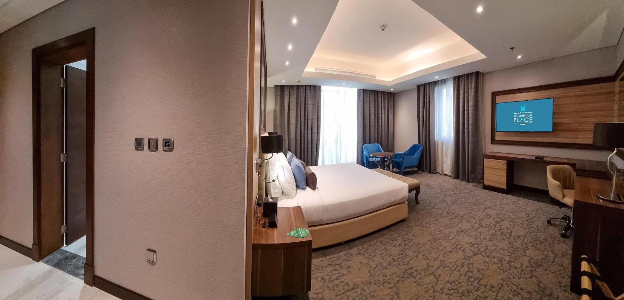 Millennium Place Doha Exterior foto A bedroom at the hotel