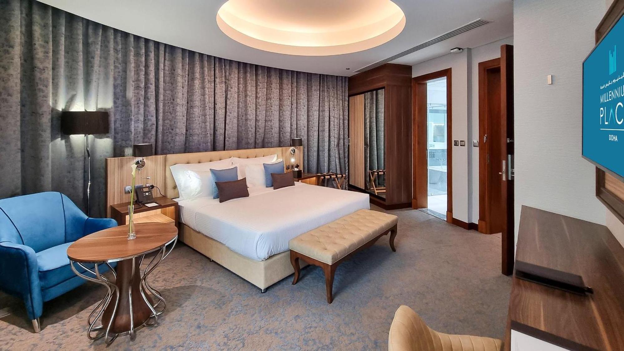 Millennium Place Doha Exterior foto A bedroom at the hotel